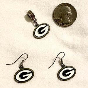 Packer earrings and charm for necklace